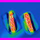 Hot dogs in buns with ketchup & mustard.